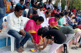Students Perform Pada Pooja to Their Parents